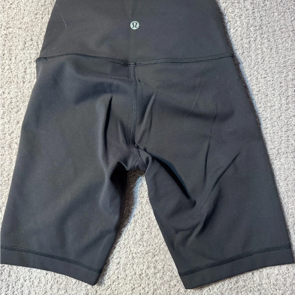 Black Lululemon Bike Shorts with Wide Waistband and Stretchy Fit - Picture 2 of 2